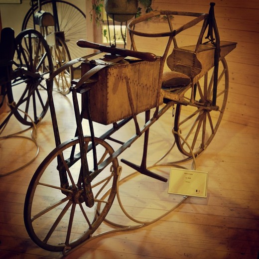 A practical yellow Draisine built in France around 1820.